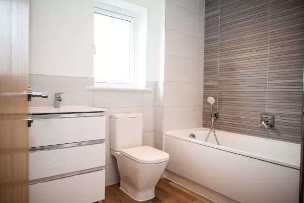 Modern white Bathroom suite in new home at Market Gardens development in Torrington