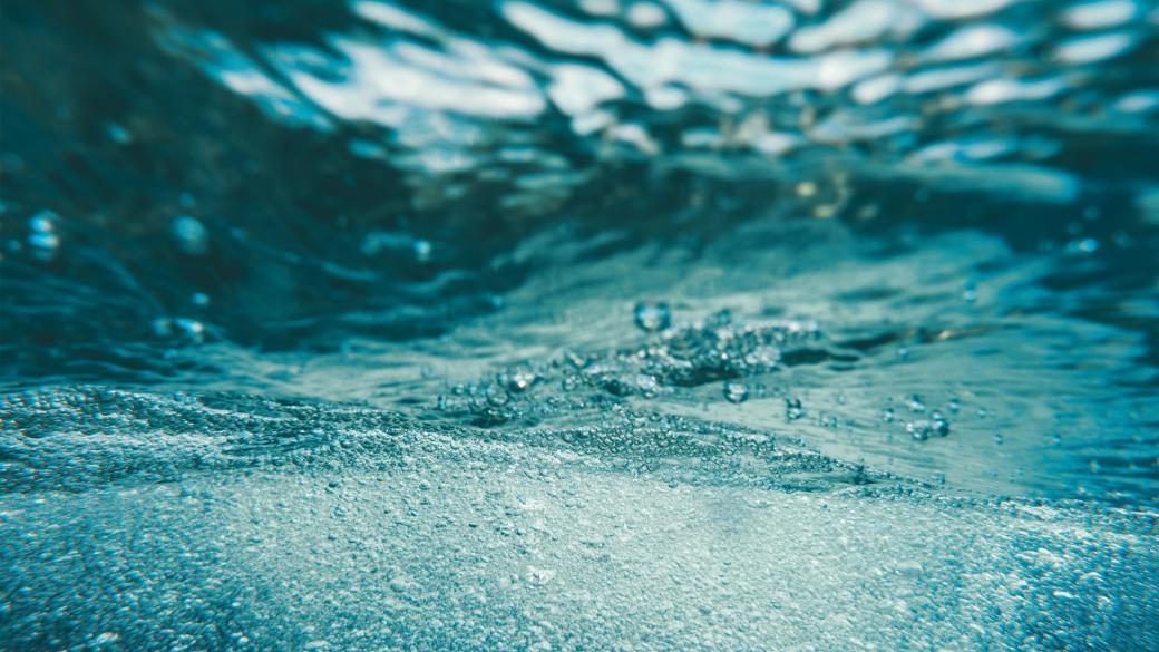 Bubbles under the surface of the waves in the sea