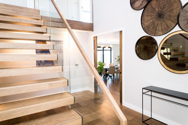 Bespoke wooden and glass staircase in luxurious new home in Saunton, Devon