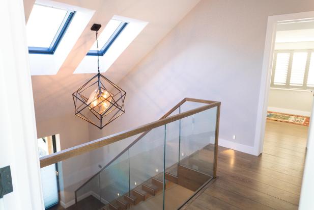 Bespoke wooden and glass staircase in luxurious new home in Saunton, Devon