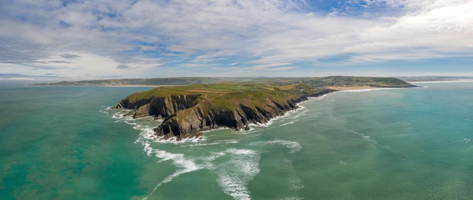 The shoreline and cliffs at Croyde, North Devon as seen from the sea