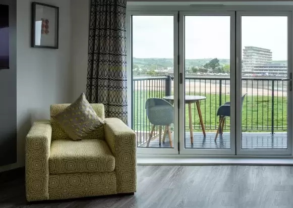 Living area of New Home with French Doors looking out to River Taw 