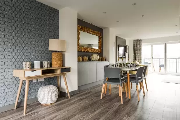 Living area with dining table in new home at Taw Wharf Barnstaple