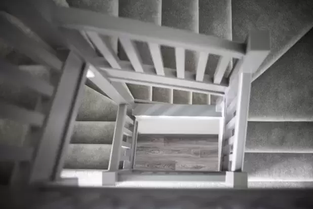 Abstract image looking down staircase of new home