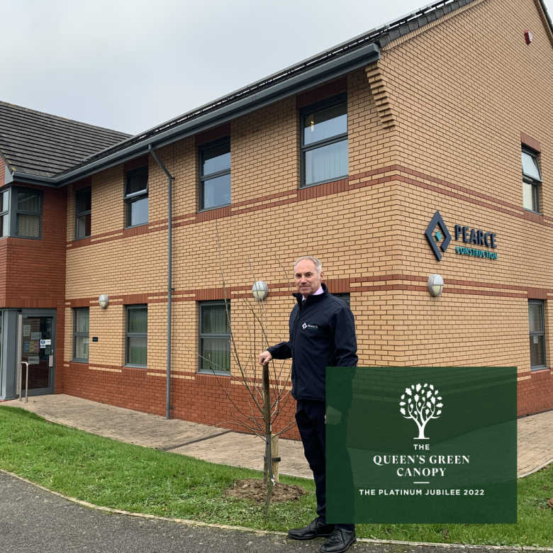 Pearce Construction Managing Director Paul Know planing tree outside their Barnstaple office.